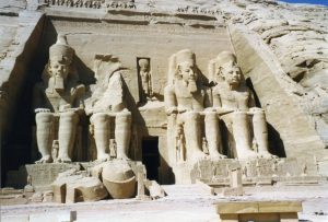 The facade of the Great Temple of Abu Simbel, carved with four colossal seated statues of Ramesses II.