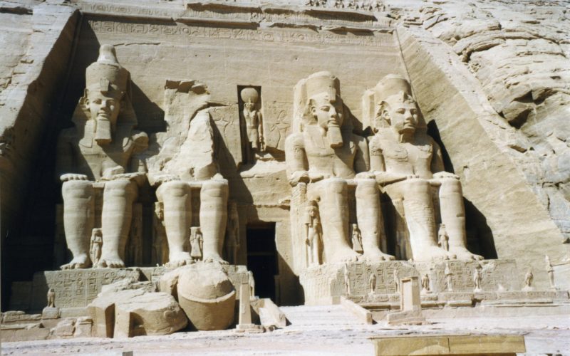 The facade of the Great Temple of Abu Simbel, carved with four colossal seated statues of Ramesses II.