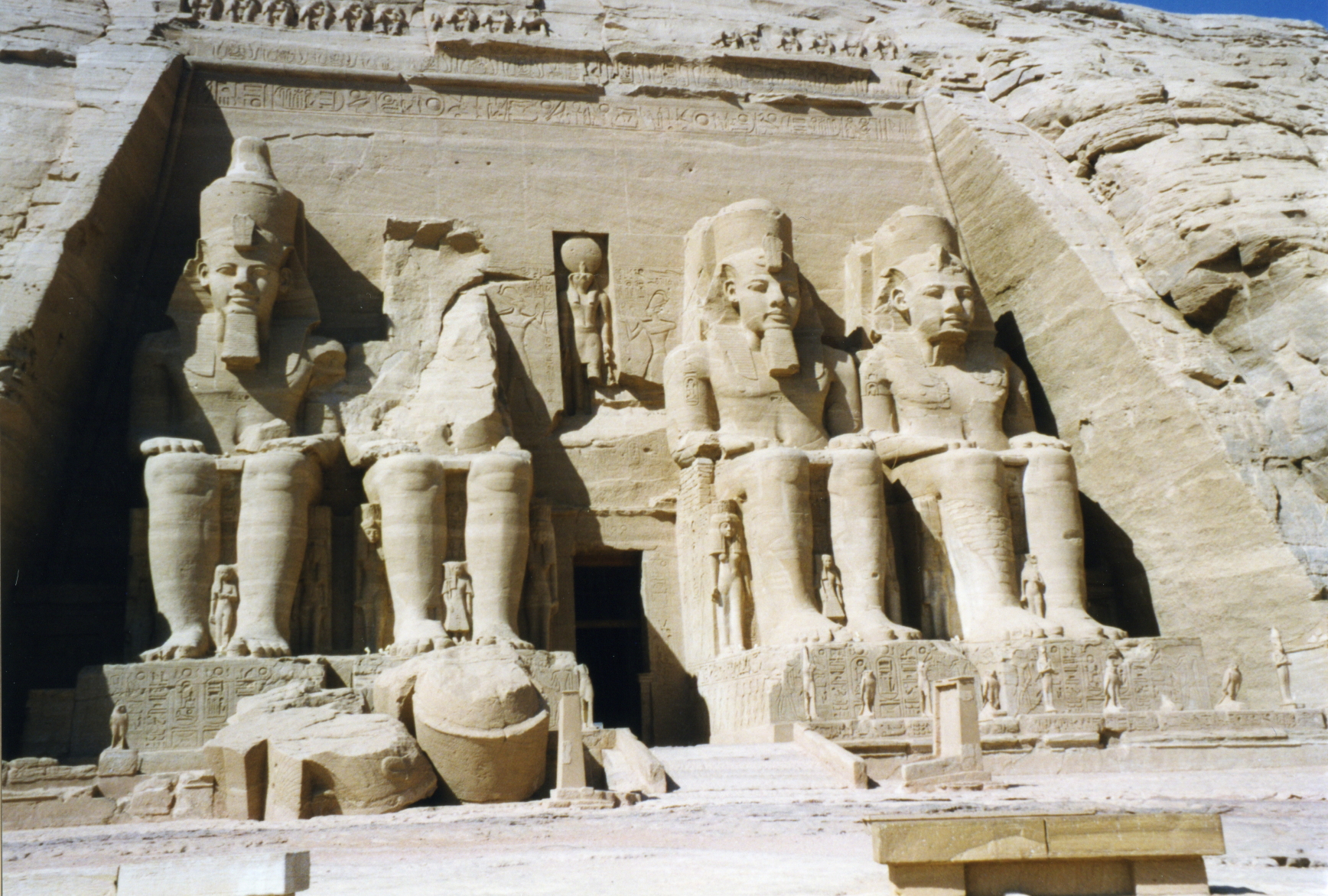 The facade of the Great Temple of Abu Simbel, carved with four colossal seated statues of Ramesses II.
