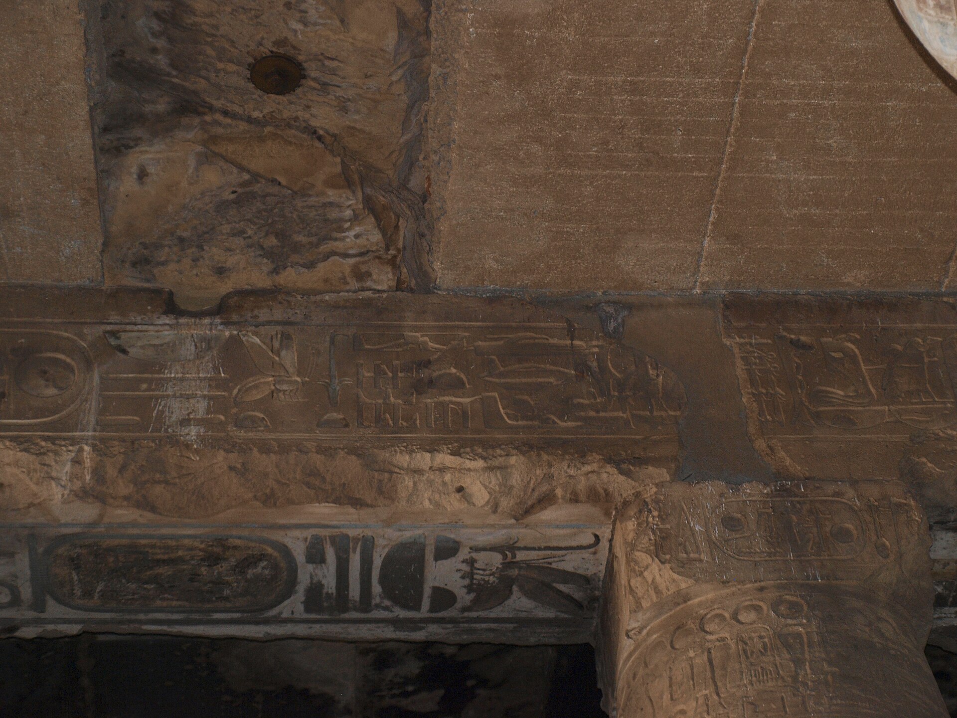 Painted hieroglyphs and figures on a temple ceiling at Abydos.