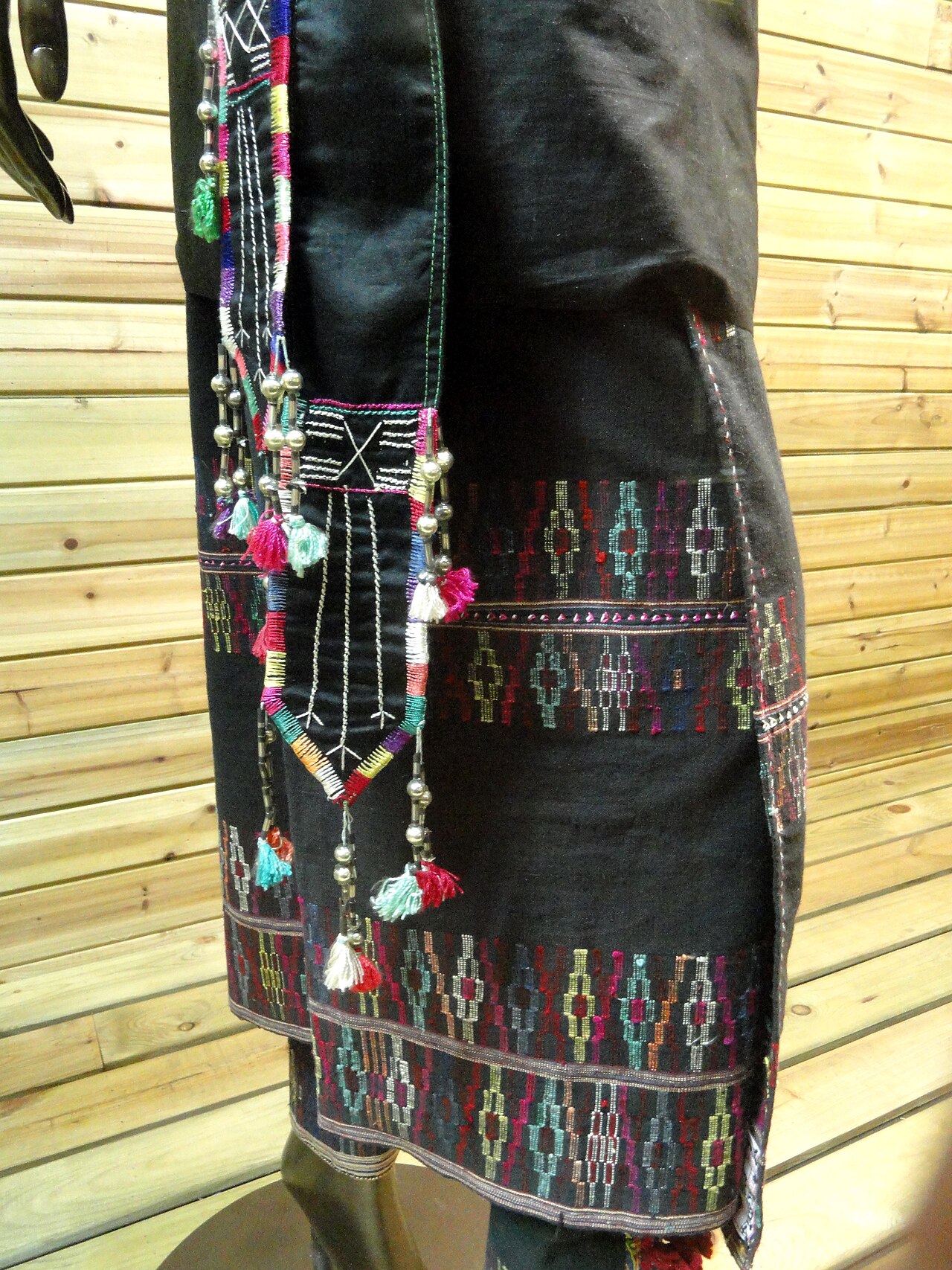 Detail of an Achang brocade dress