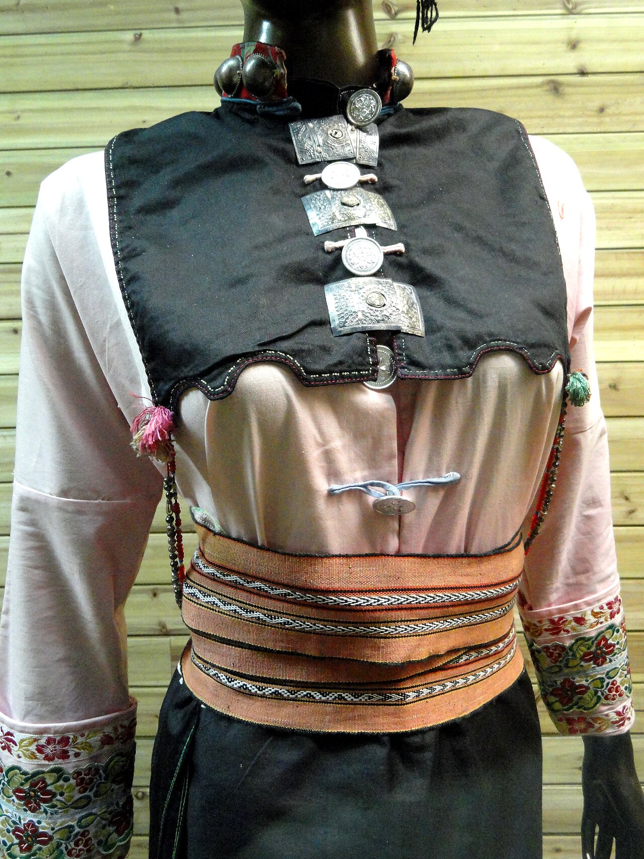 Detail of an Achang brocade dress