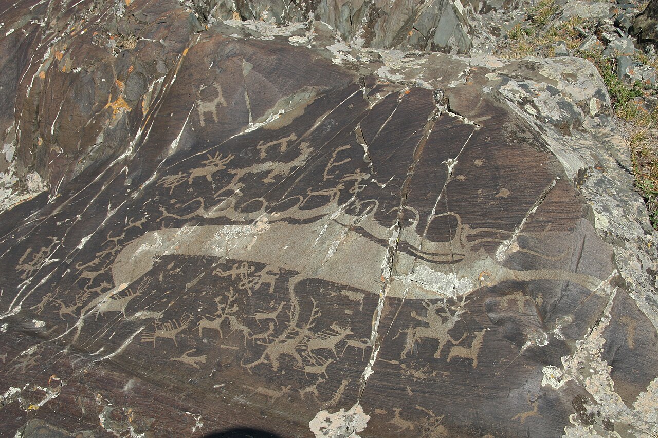 Ancient petroglyphs carved on the rocks of the Altai
