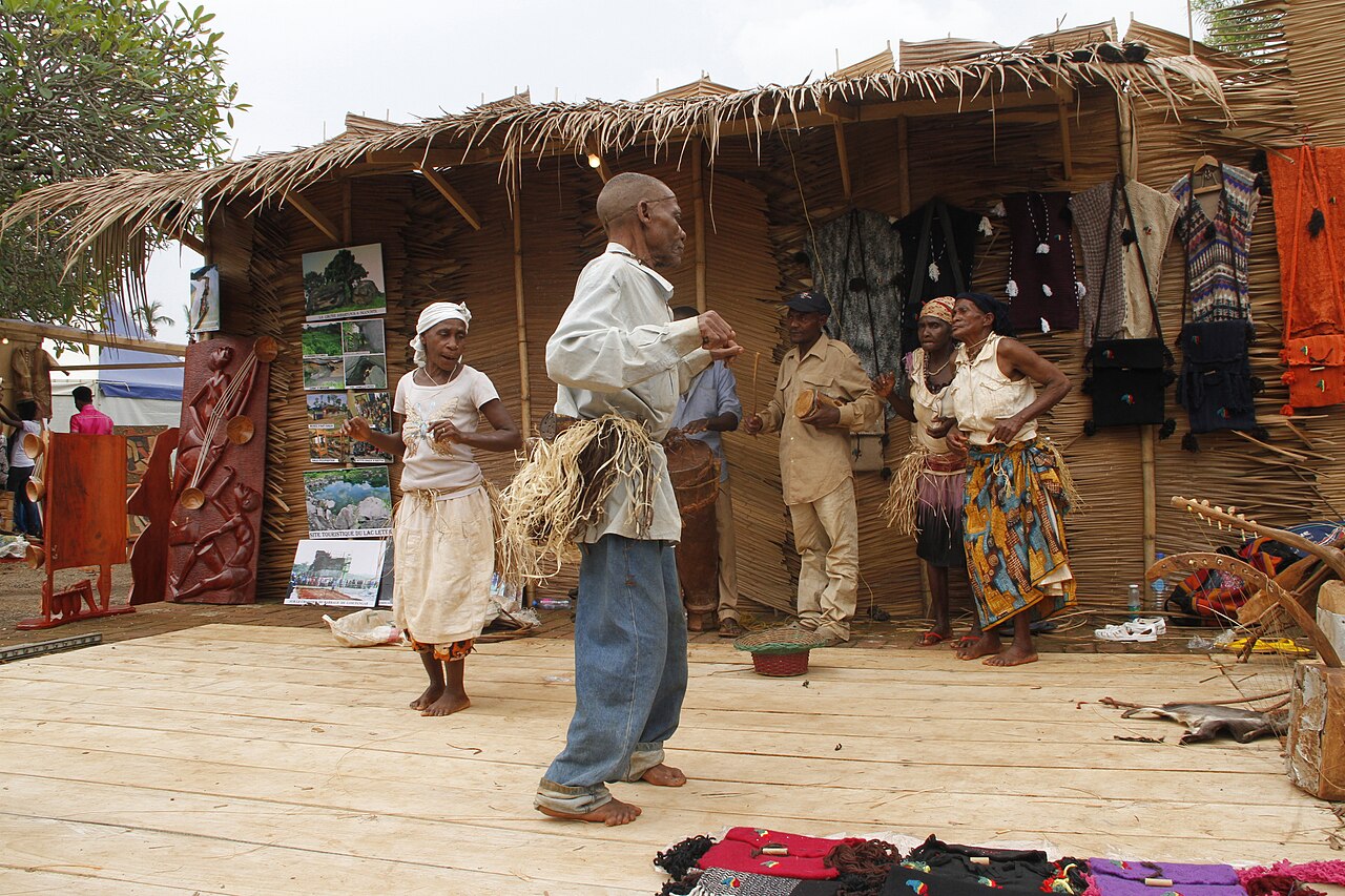 Forest people dancing; the Baka are renowned for their polyphonic singing.