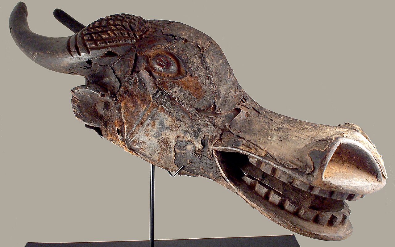 A leather-bound buffalo mask of the Bamum, worn at royal ceremonies.