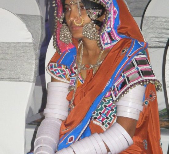 A Banjara (Lambani) woman in the vivid traditional dress of the community
