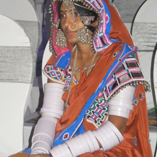 A Banjara (Lambani) woman in the vivid traditional dress of the community