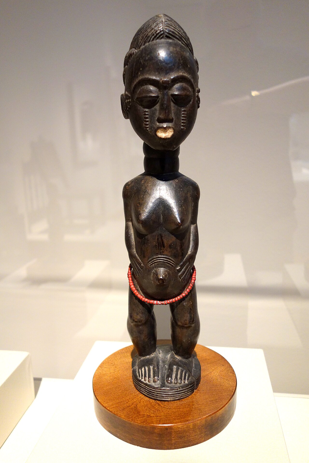 A Baoulé spirit-spouse figure, the blolo bla, of the other-world partner.