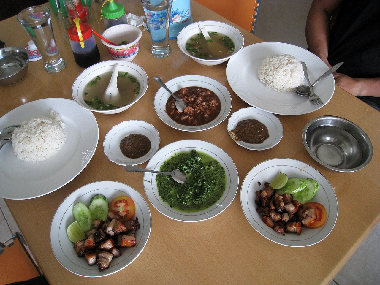 Saksang and grilled meat, dishes of the Batak table