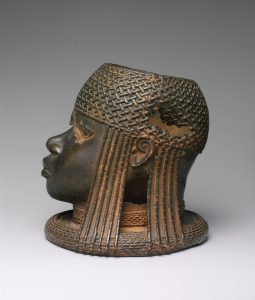 A commemorative brass head of an Oba of Benin, cast to honour a deceased ruler on his ancestral altar