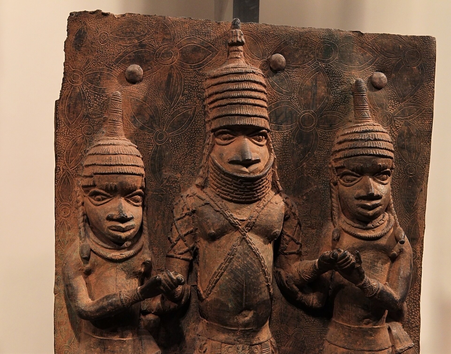 Benin plaques once covered the pillars of the royal palace, forming a cast-metal record of the court