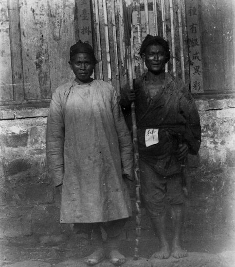 Bouyei people in a photograph from 1902