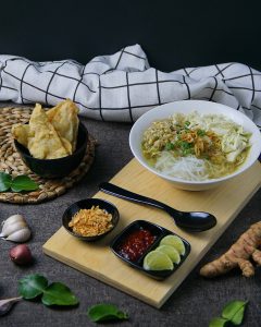 A bowl of soto, a soup in the style of the Makassar table
