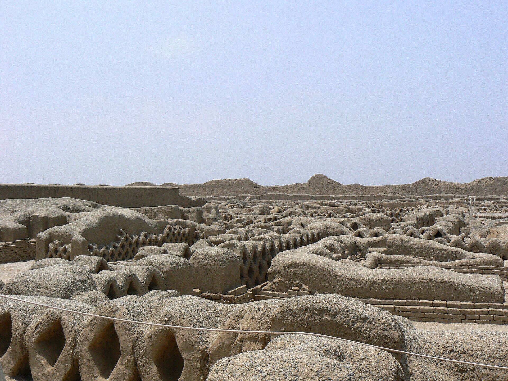 The eroded adobe ruins of Chan Chan near modern Trujillo, Peru.
