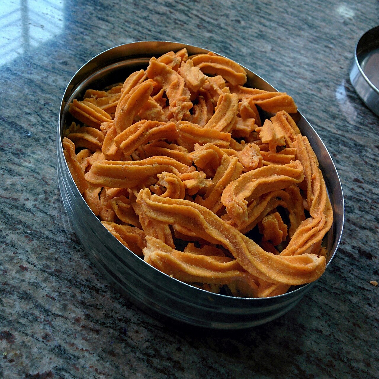 A rice-flour snack of the central Indian kind