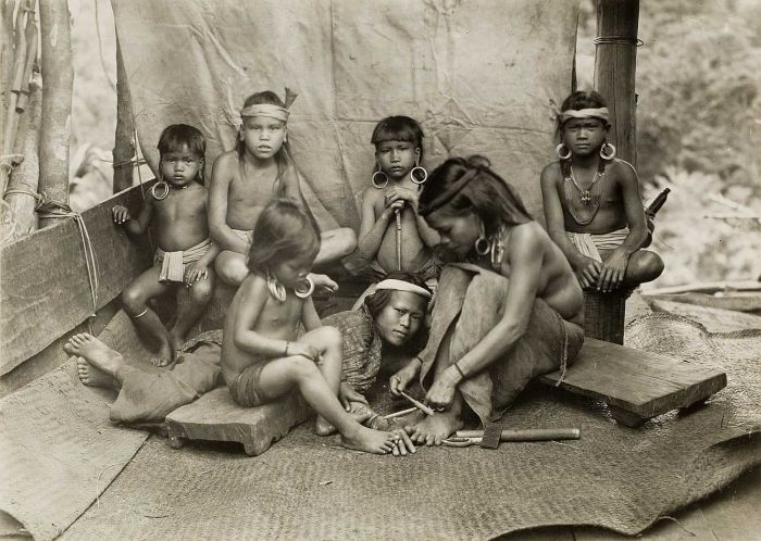 A group of Kayan Dayak in an early photograph