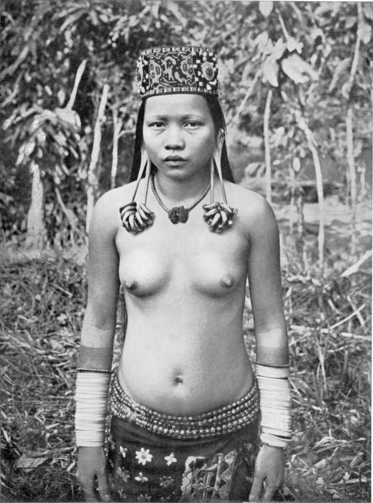 A Dayak woman with the elongated earlobes once prized as a mark of beauty