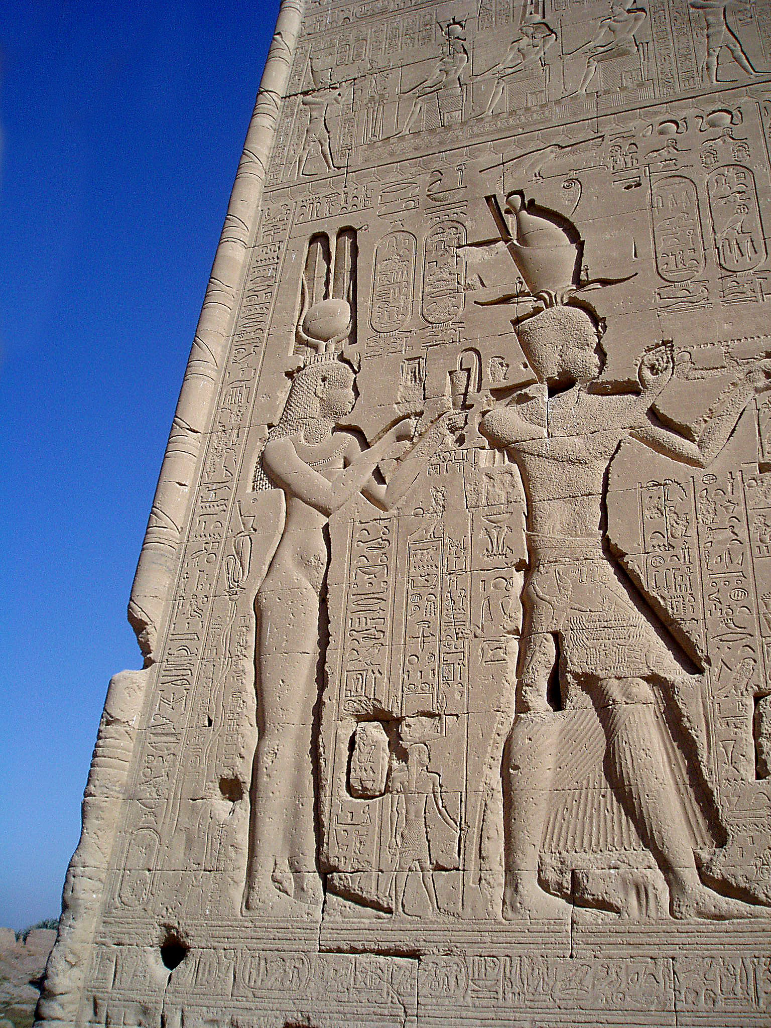 A relief on the outer wall of Dendera showing Cleopatra and her son Caesarion.