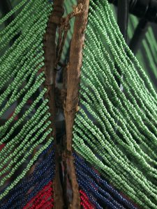 A Dinka man in beaded ornament