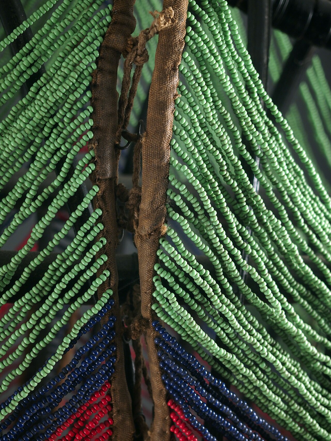A Dinka man in beaded ornament
