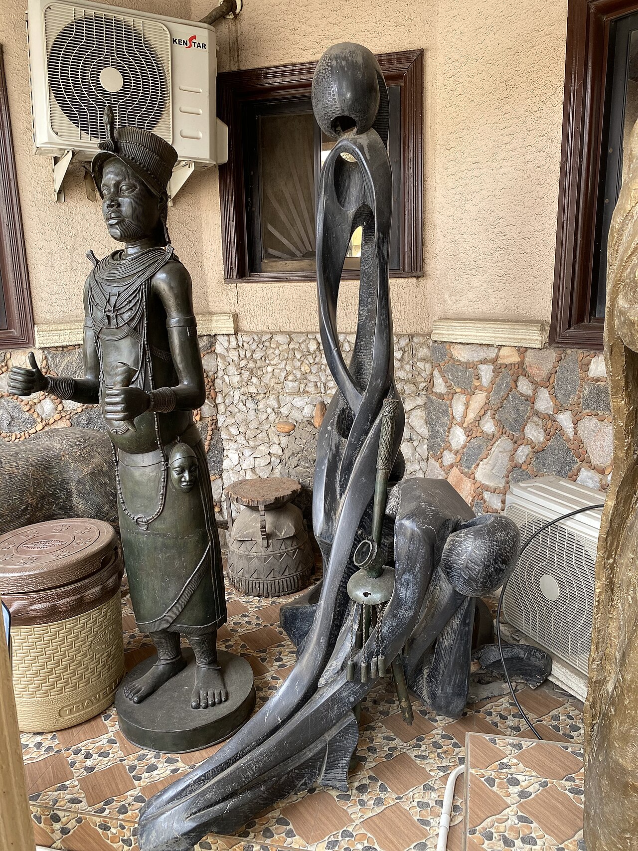 A Benin Kingdom sculpture of mother and child, from the Edo court tradition.