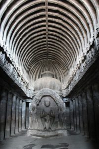 The carved pillars of a rock-cut hall at Ellora.