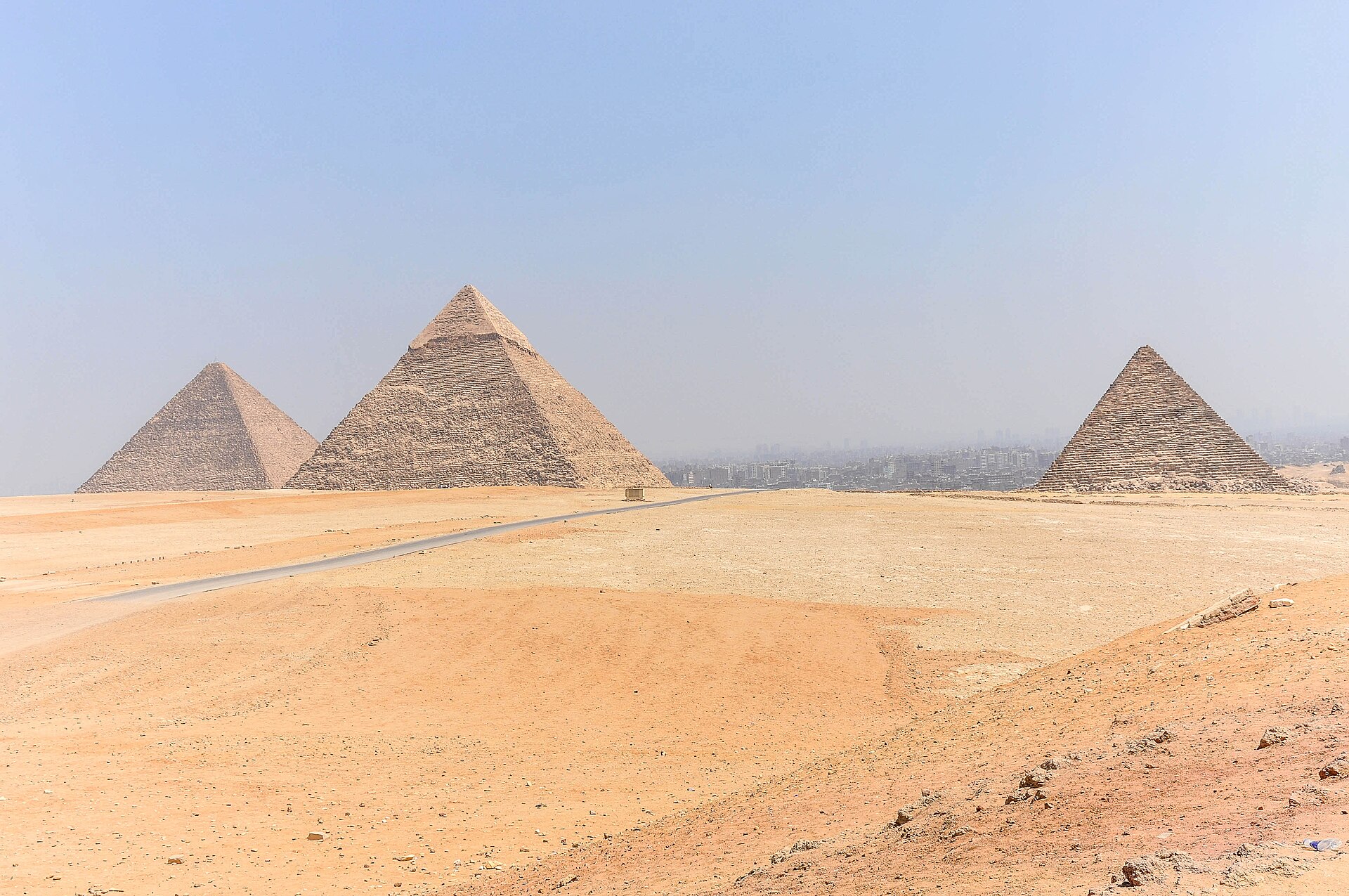 The three great pyramids of Giza rising from the desert plateau.