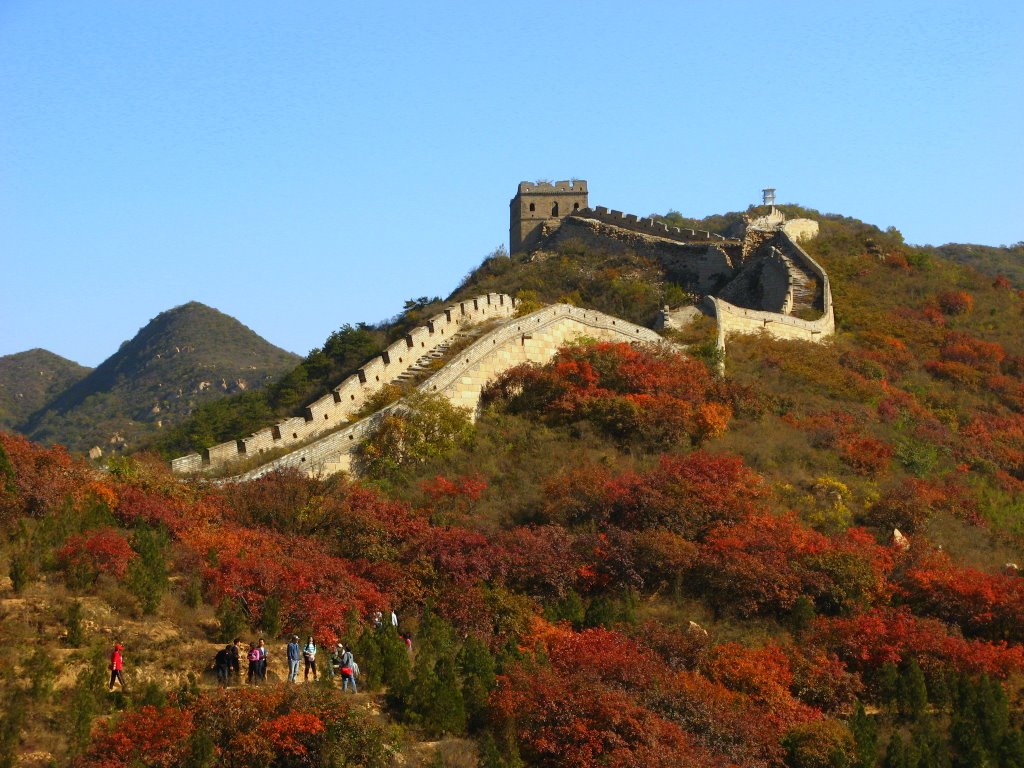 The Great Wall of China amid mist and mountains.