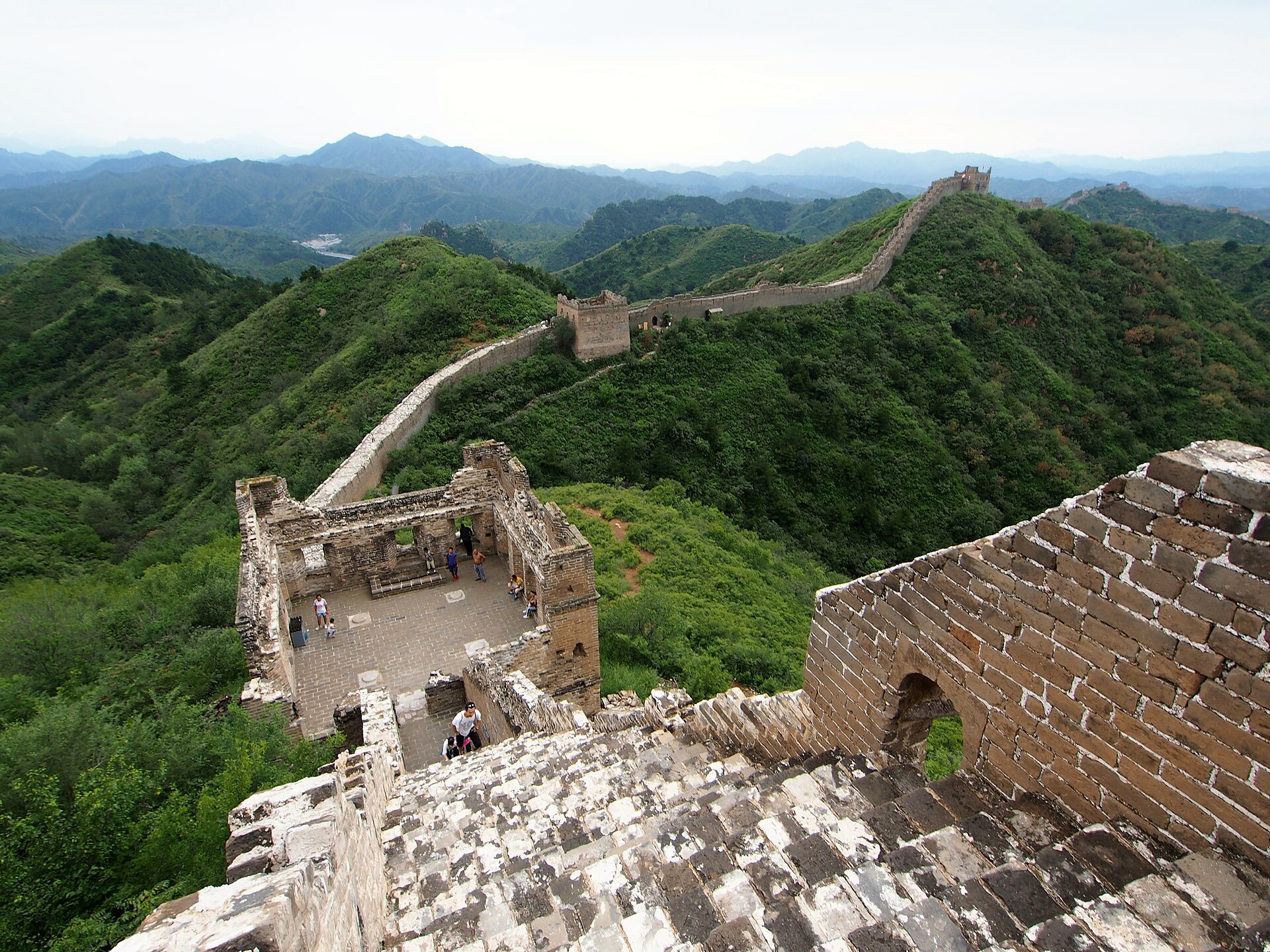 A steep section of the Great Wall climbing sharply up the hills.