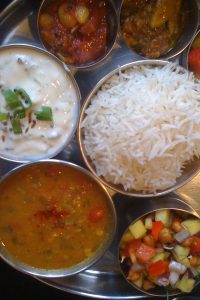 A thali of the north Indian style, with bajra and wheat breads