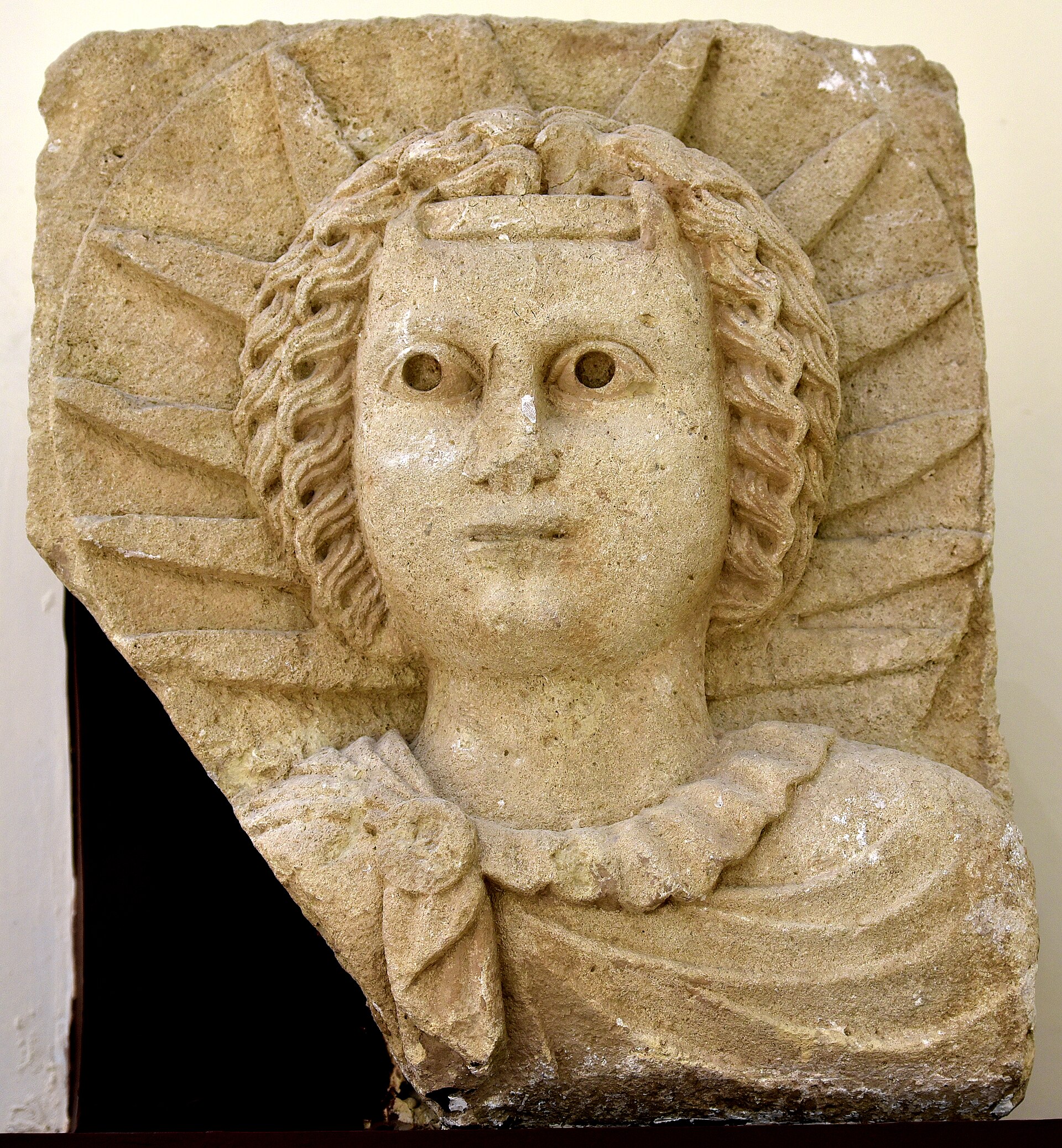 A sculpted head from Hatra, showing the distinctive art of the city.
