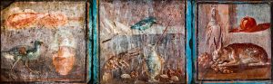 A vivid wall painting preserved on a house wall at Herculaneum.