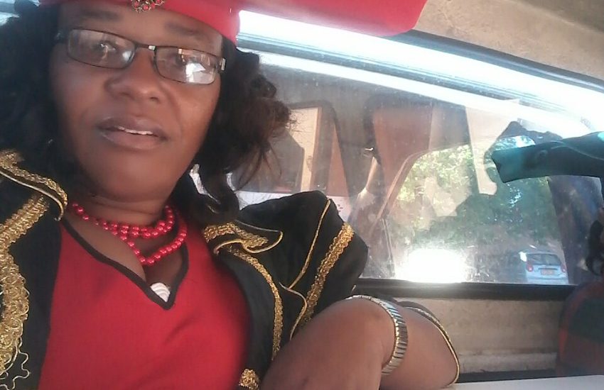 A Herero woman in the distinctive long Victorian-style dress of the people.