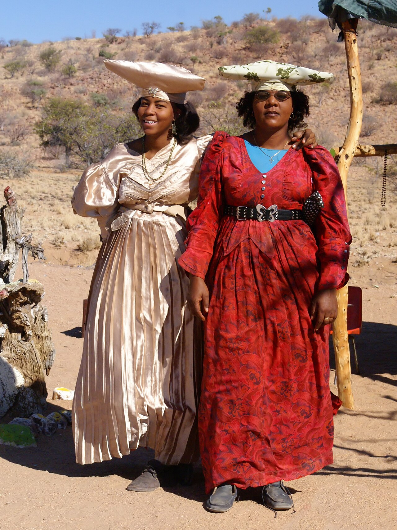 Herero women in traditional dress; the people speak Otjiherero.