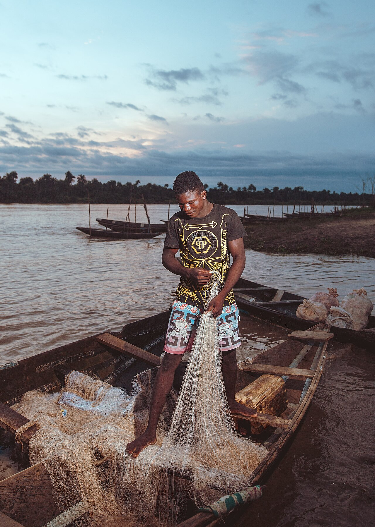 Fishing on the creeks; the Ijaw are above all a people of the water.