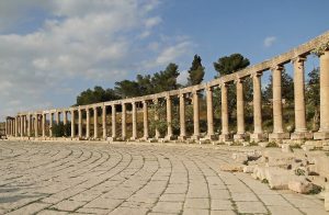 The great Oval Plaza of Jerash, ringed by columns at the entrance to the ancient city.