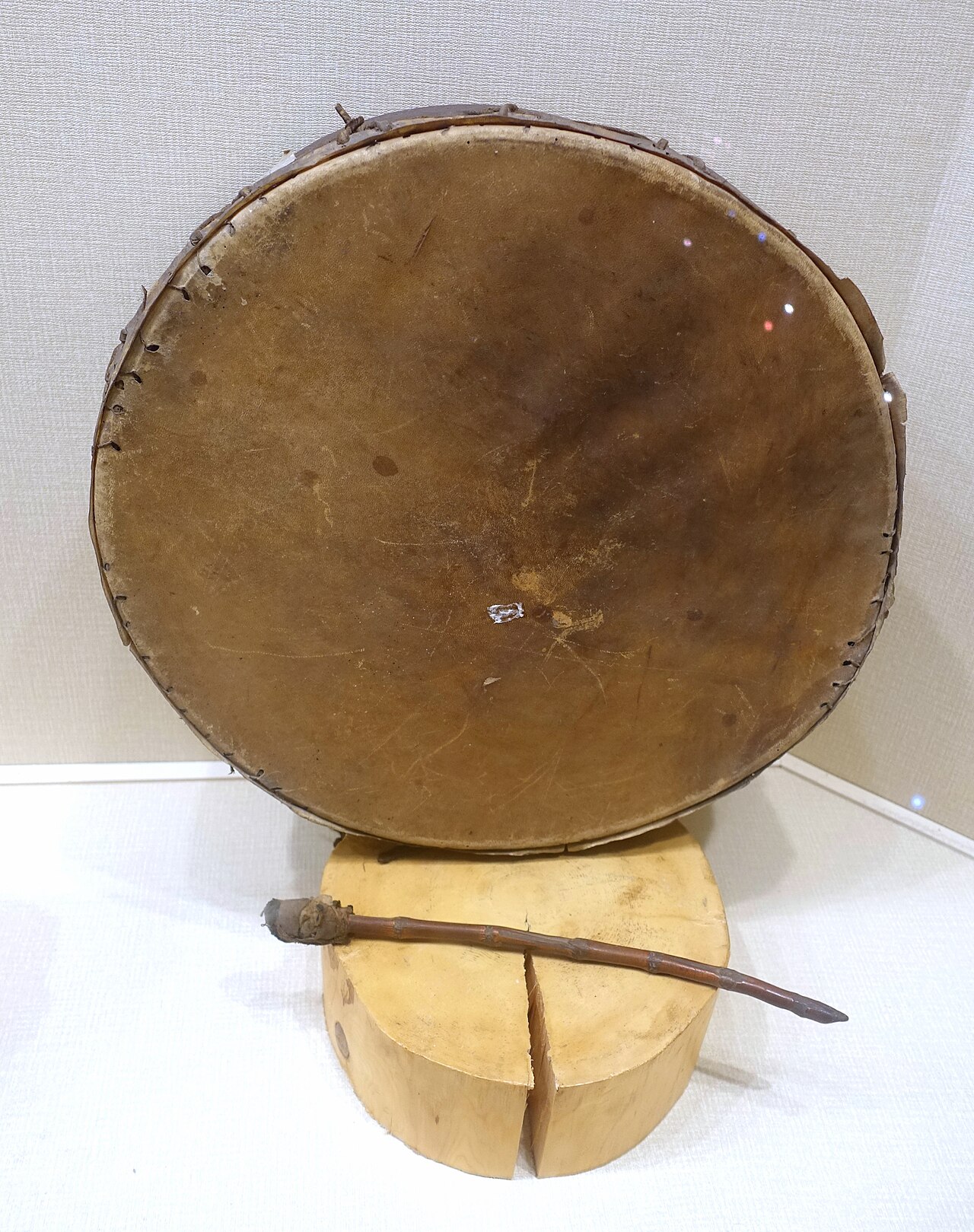 A ceremonial drum, echoing the Jino's revered sun-drum (taiyanggu)