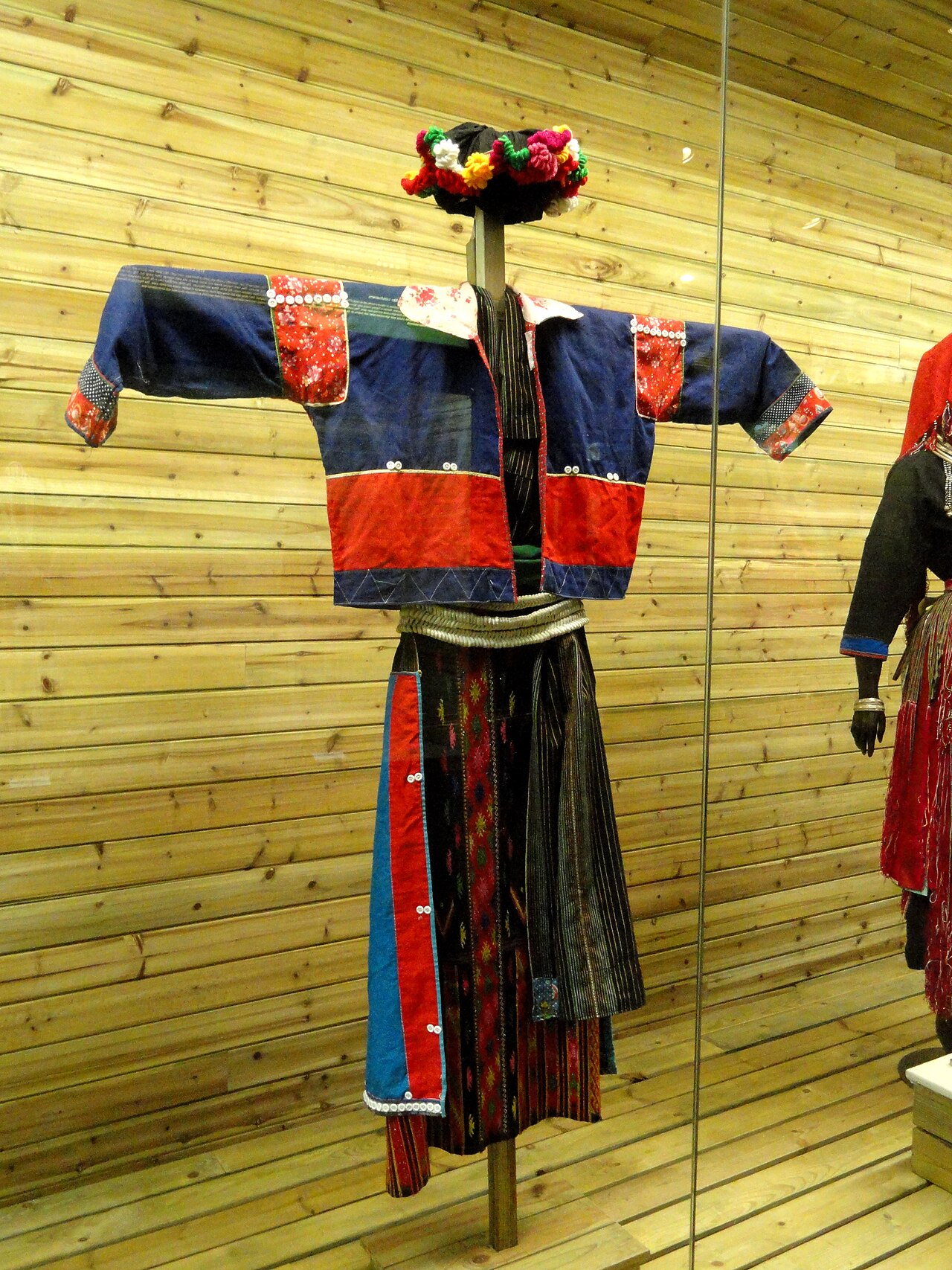 A Jingpo woman in brocade dress