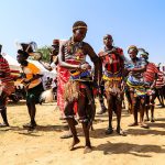 Karamojong dancers in northeastern Uganda, a Nilotic pastoral people.