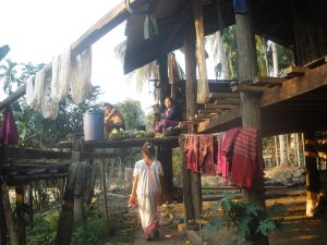 A Karen family in the traditional woven dress worn at festivals