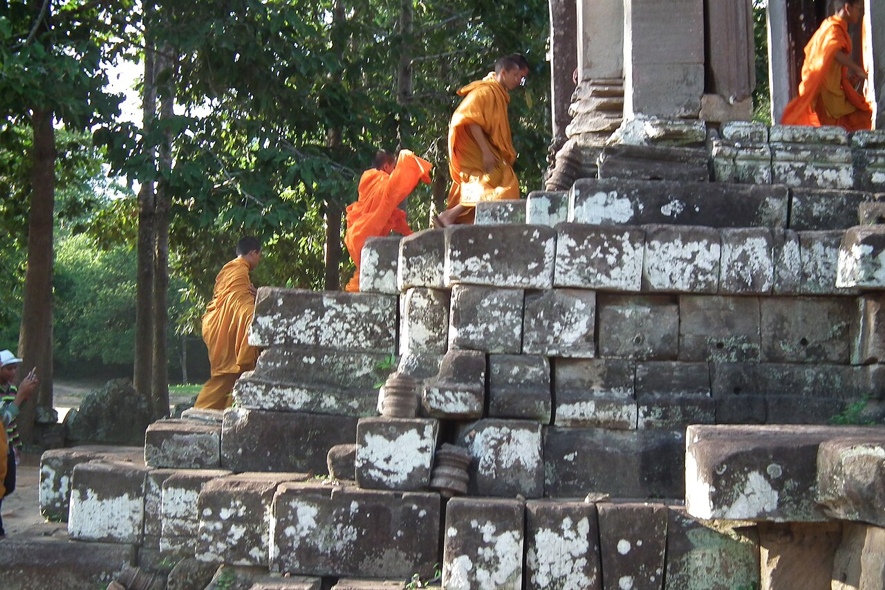 A temple among the ruins of Angkor, centre of Khmer Buddhism and Hinduism