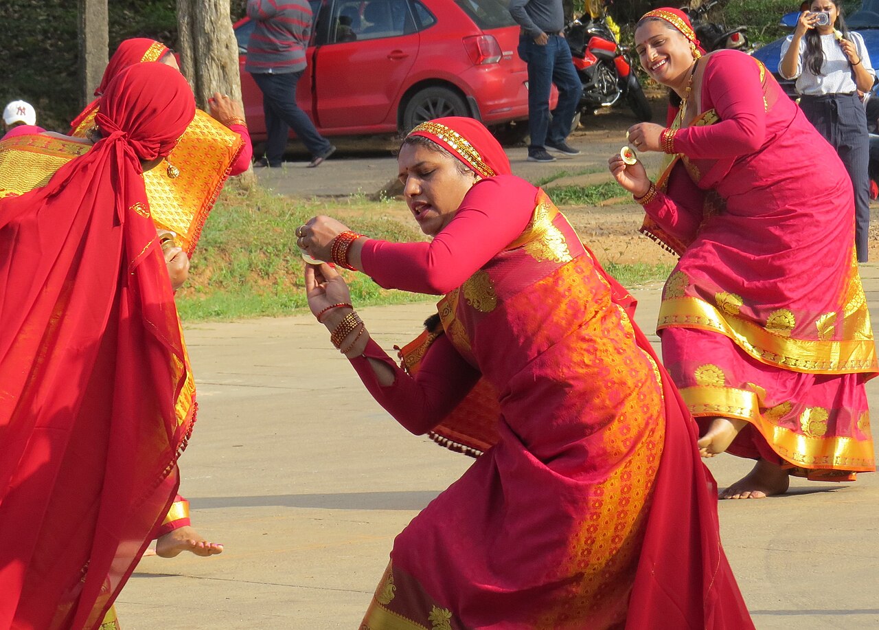 A Kodava man wearing the kupya robe with the peeche kathi dagger
