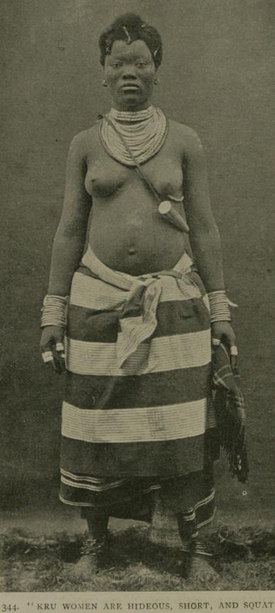 A Kru woman in traditional dress and adornment.