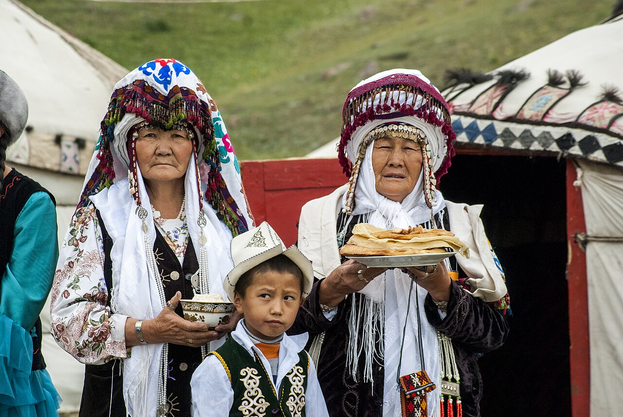 Kyrgyz women offering bread and salt