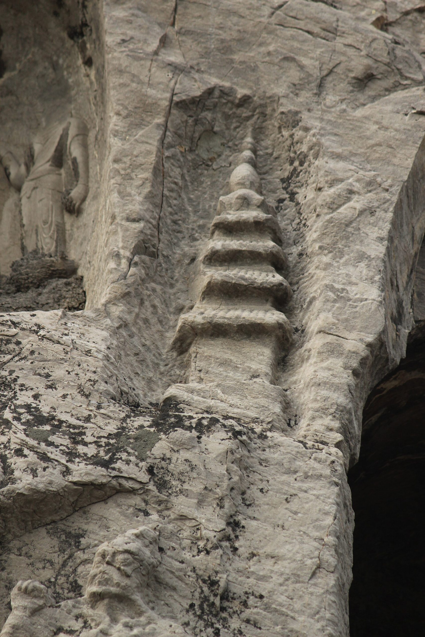 A fierce guardian figure carved at the Longmen Grottoes.
