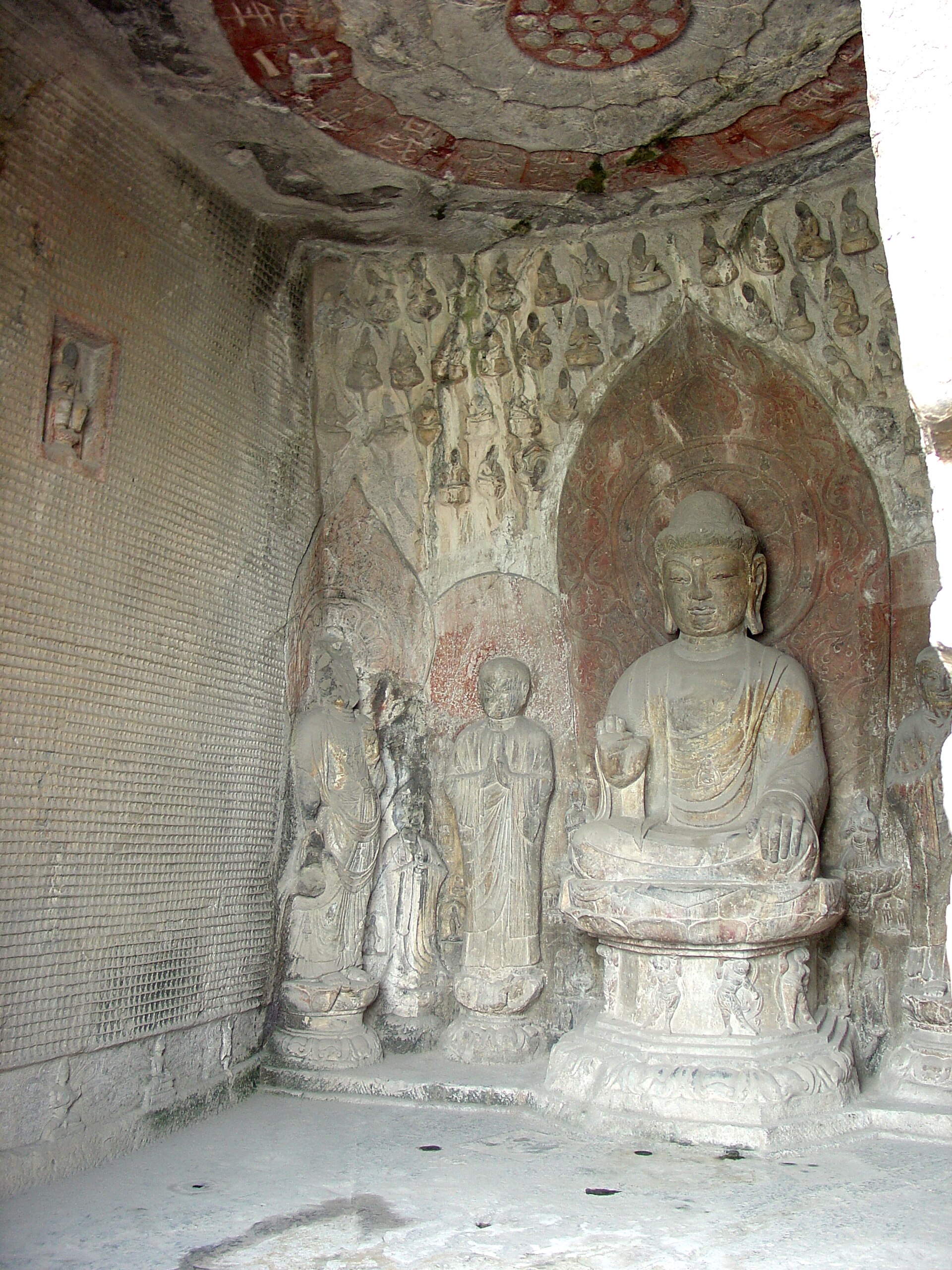 Thousands of small Buddha figures carved into the walls at Longmen.