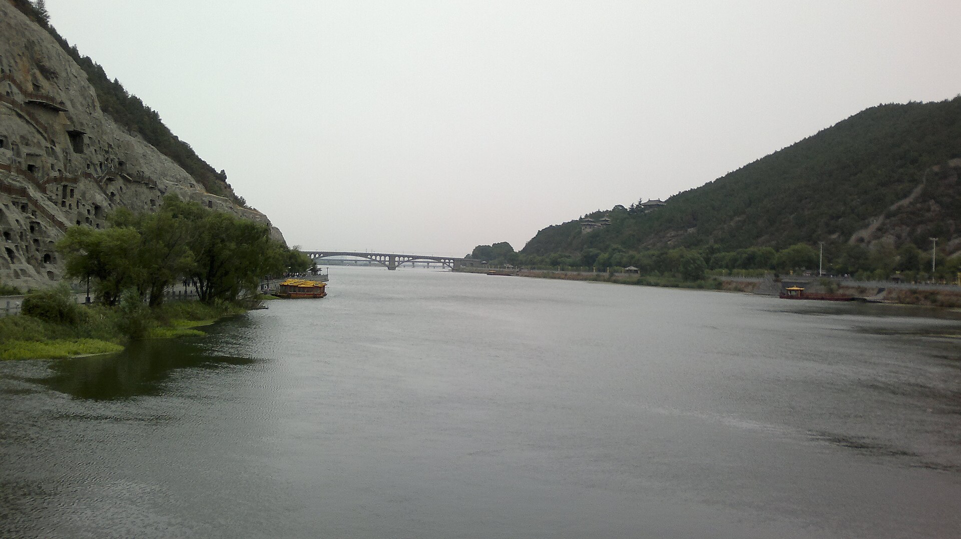 The Longmen Grottoes lining the banks of the Yi River near Luoyang.