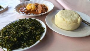 Ugali served with stew, the everyday meal across Luhya country.