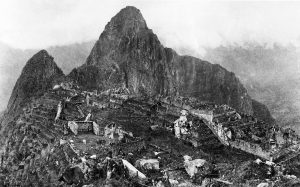 Temples and plazas of Machu Picchu spread along the mountain ridge