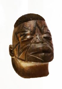 A Makonde mask, of the kind used in the masked mapiko dance.